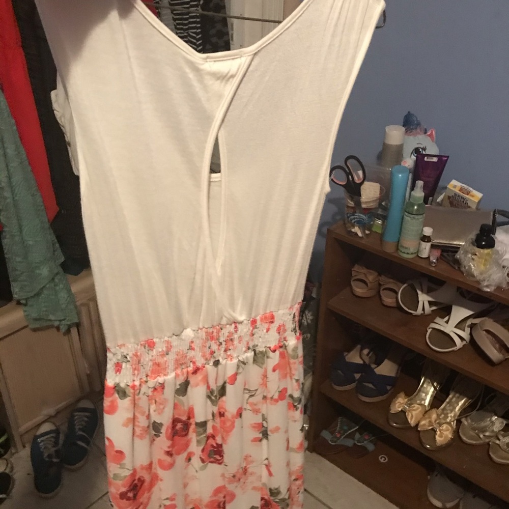 a dress with a flower bottom and keyhole back